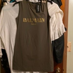 Cotton/spandex sleeveless dress. Olive green, 31 inches long. Adorable.